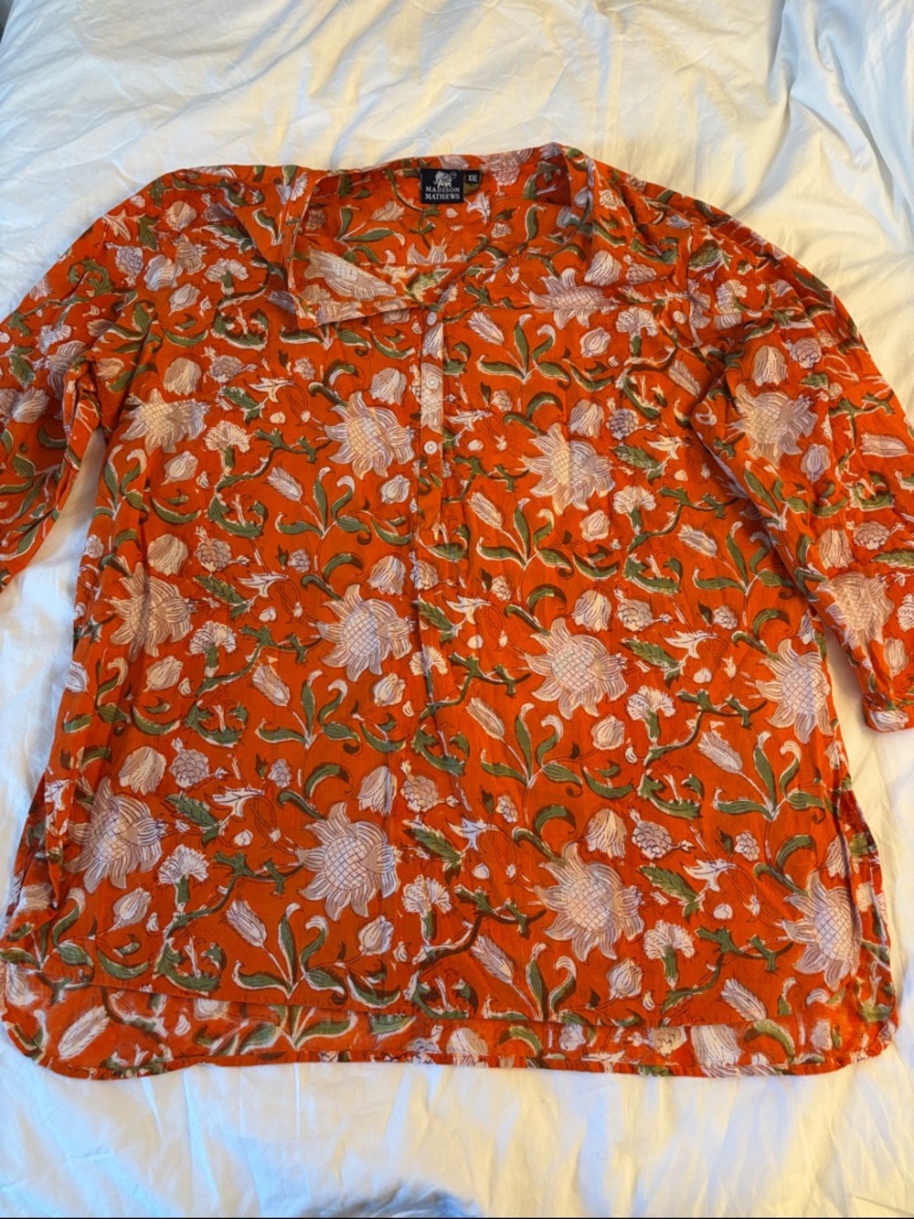 Madison Mathew’s linen Sea Flower-Print Split-Neck Tunic dress in Orange